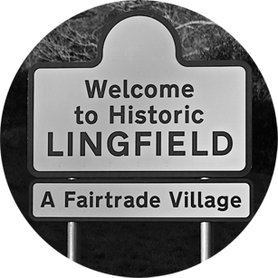 Lingfield Village sign - Welcome to historic Lingfield. A Fairtrade Village
